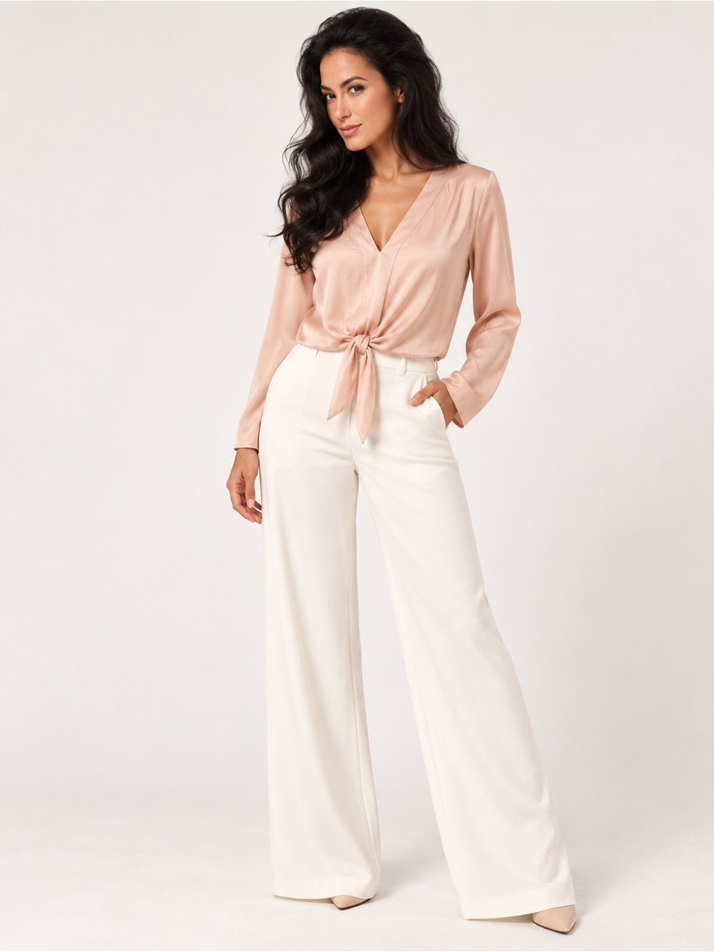Alexis blush colored long sleeve shirt that ties on the bottom.